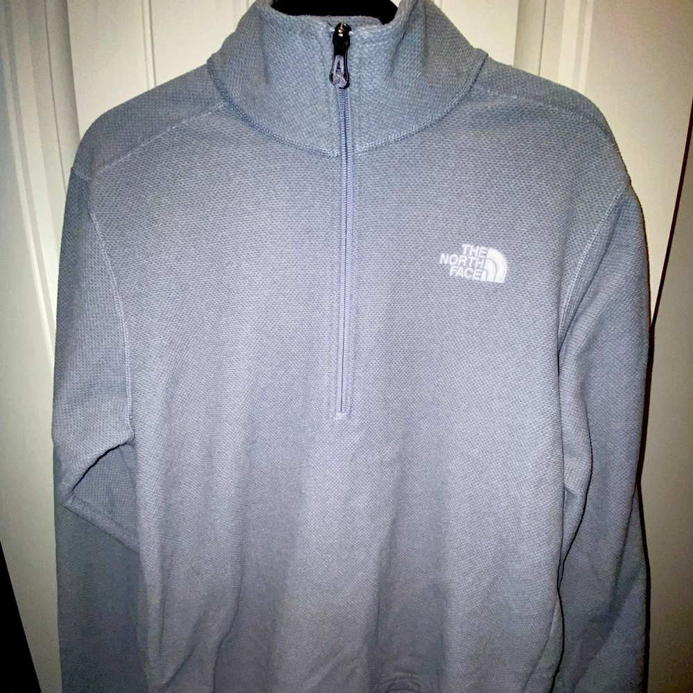 Grey North Face half zip. Size M.